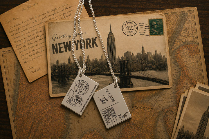 Sterling silver five boroughs postcard necklace marking 50 years of the TCS New York City Marathon.
